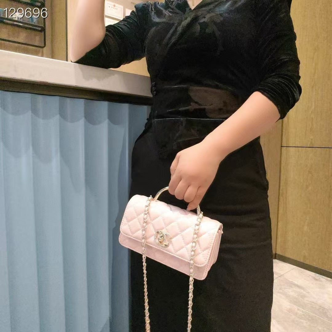 C Series | Genuine Leather Quilted Top-Handle Mini Bag – Golden Metal Frame Design